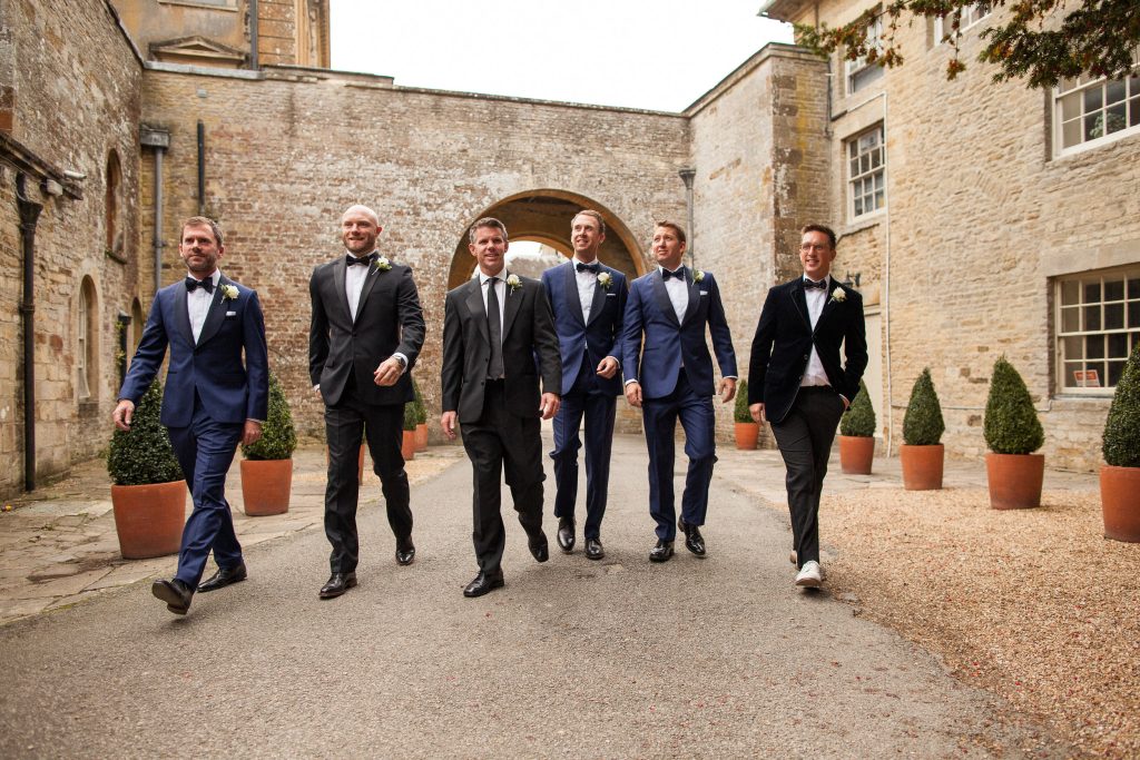 5 different men wearing bespoke suits for an occasion 